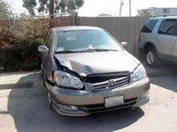 A  auto collision resulted in front-end auto damage.